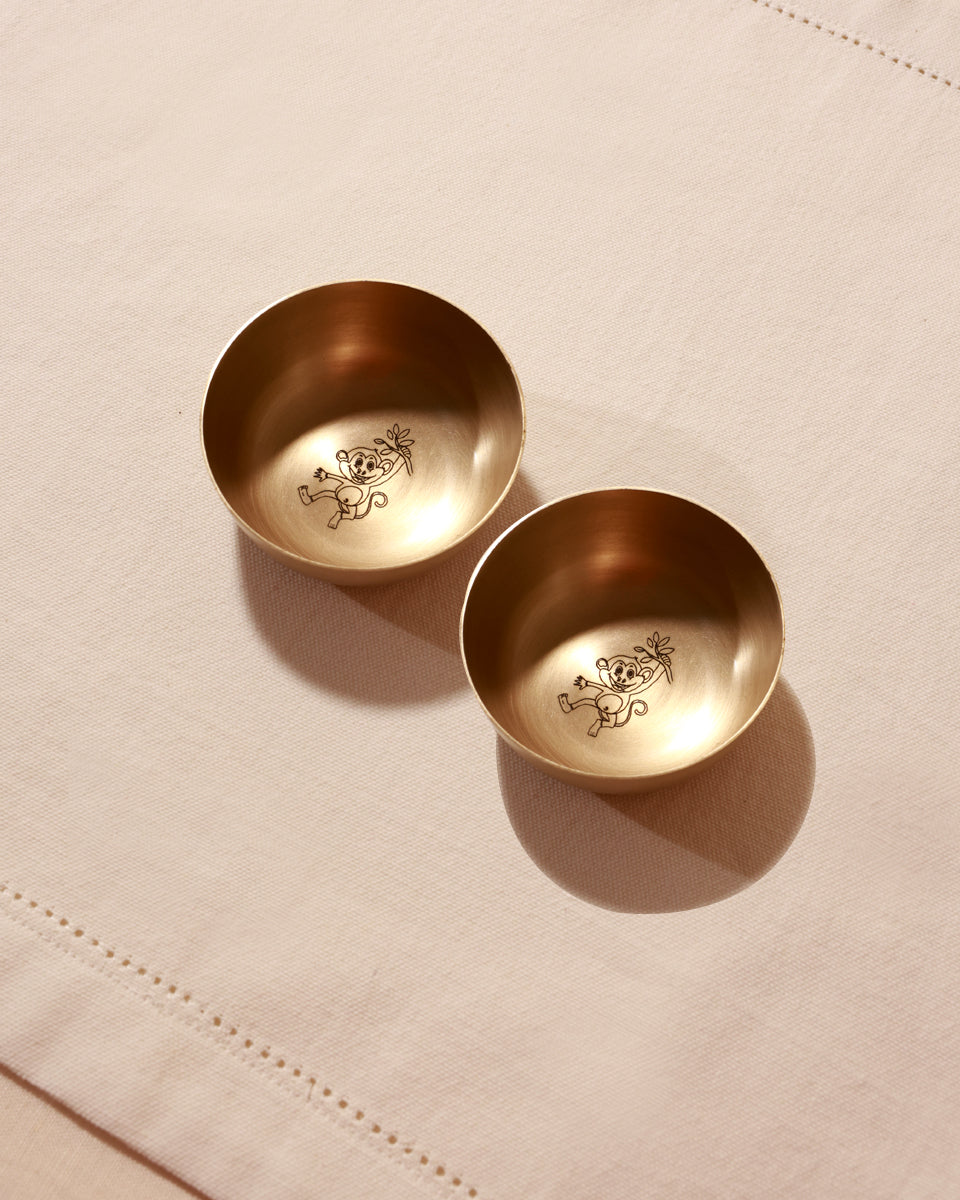 Small brass bowls with engraved designs